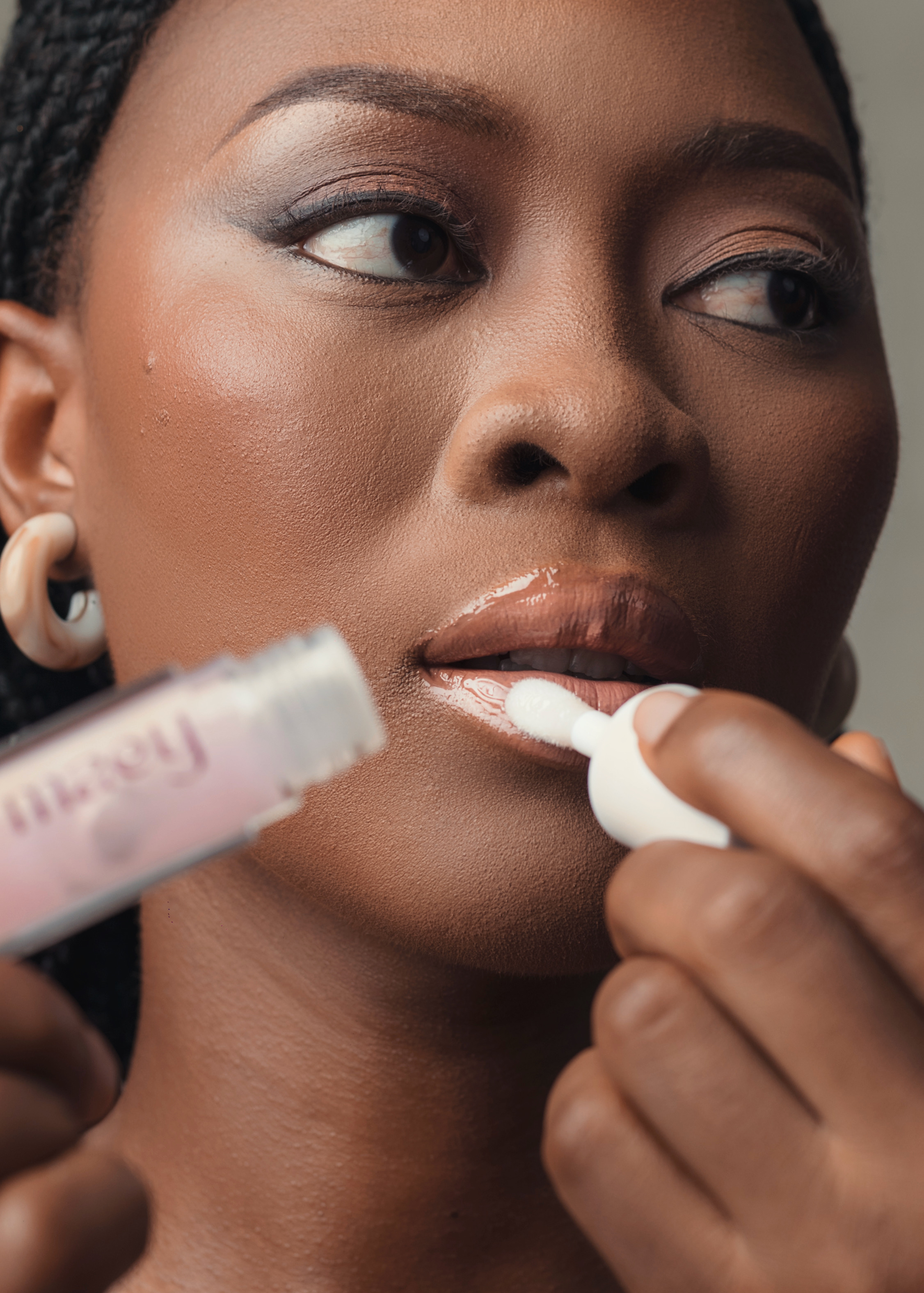 Maey lip gloss on model - photographed by Haarun Taofeek for Maey lip gloss brand